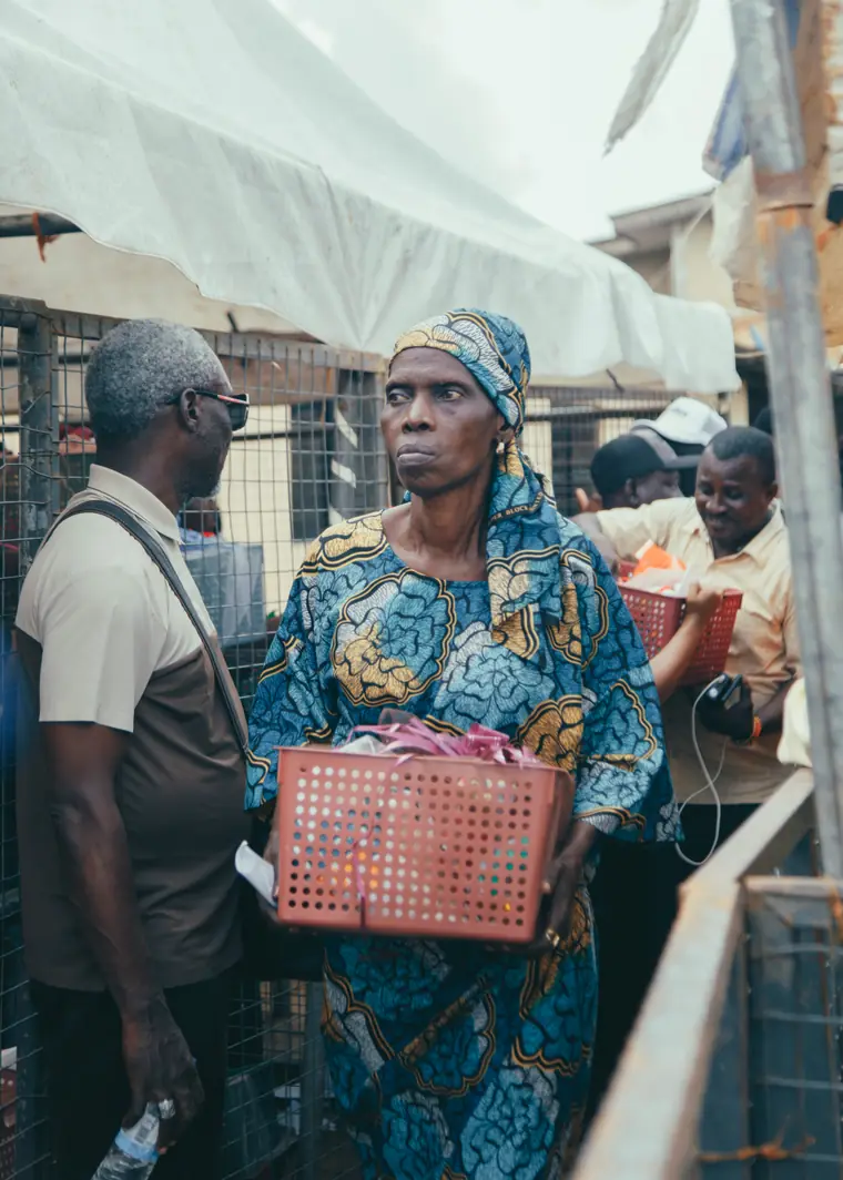 A woman collects her relief package.