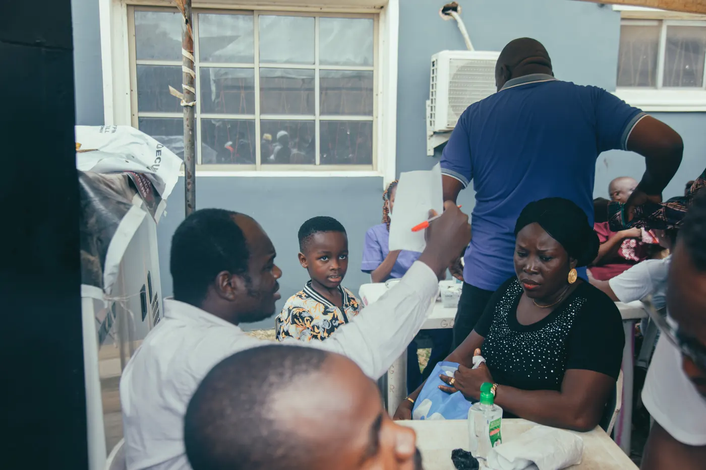 A child being seen by medical staff at the Mushin free medical outreach.